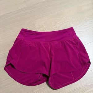 Lululemon Athletica speed up mid rise 4” 
Magenta purple